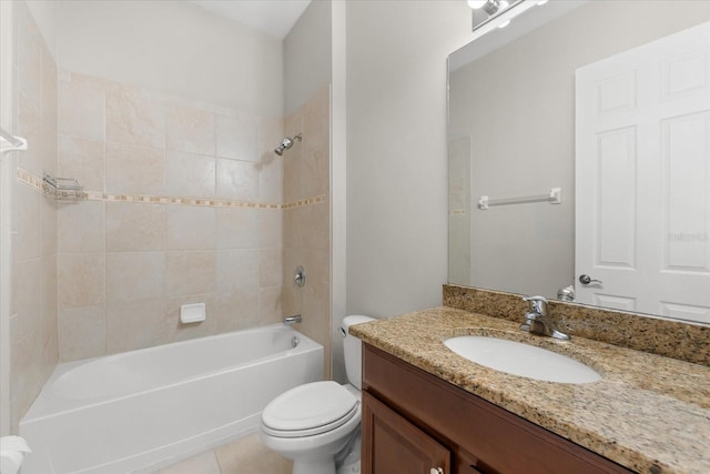 full bathroom with toilet, tiled shower / bath combo, vanity, and tile patterned flooring