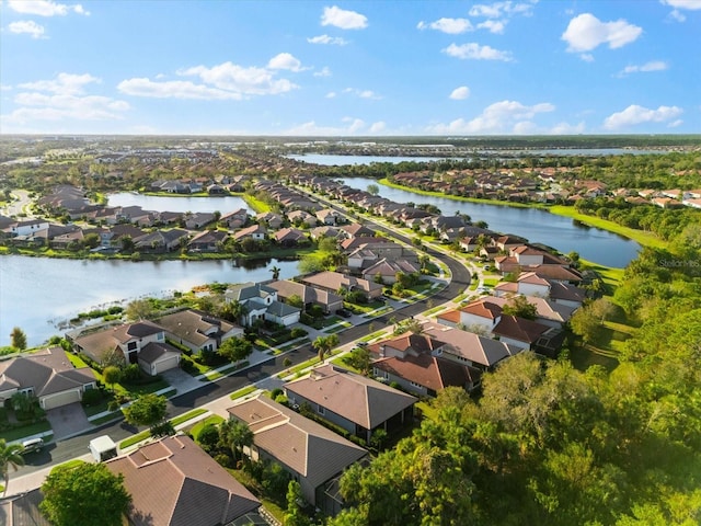 drone / aerial view featuring a water view