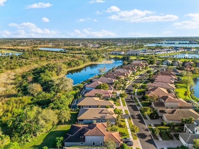 drone / aerial view with a water view