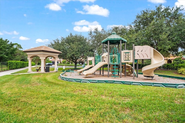 view of play area with a lawn, a gazebo, and cooling unit