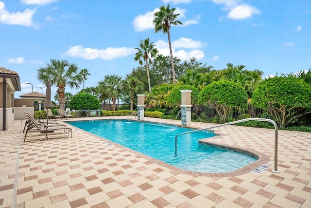 view of pool featuring a patio