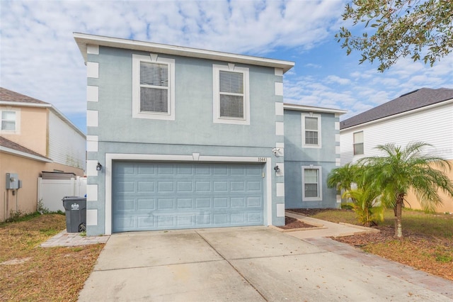 front of property with a garage