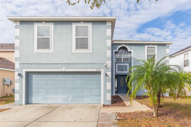 view of front of property featuring a garage