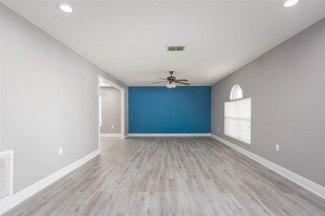 unfurnished room with ceiling fan and light hardwood / wood-style flooring