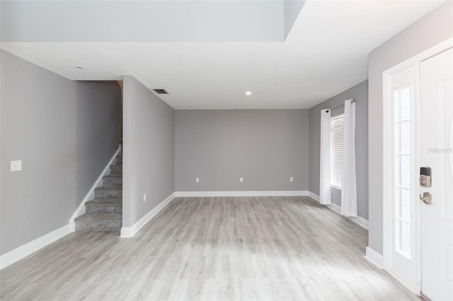 entrance foyer with light hardwood / wood-style floors