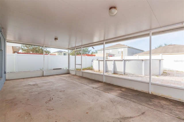 unfurnished sunroom with a healthy amount of sunlight