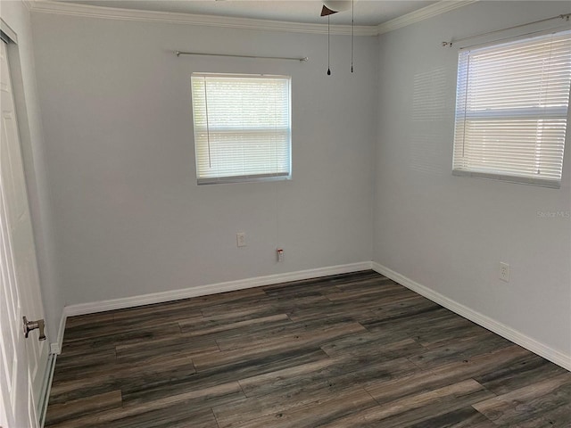 unfurnished room featuring dark hardwood / wood-style flooring and ornamental molding