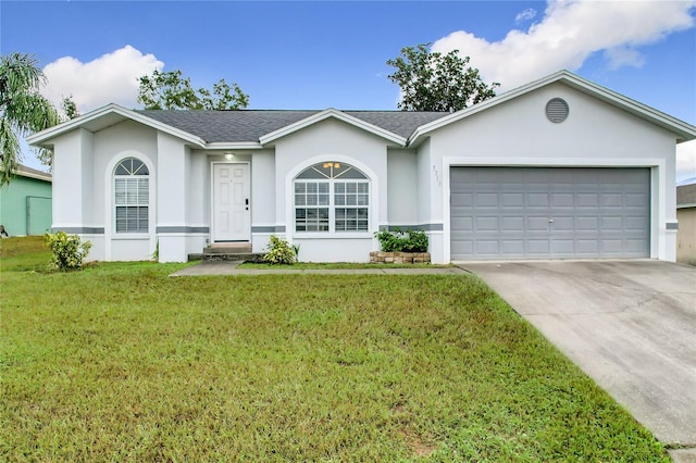 ranch-style house featuring a front lawn and a garage