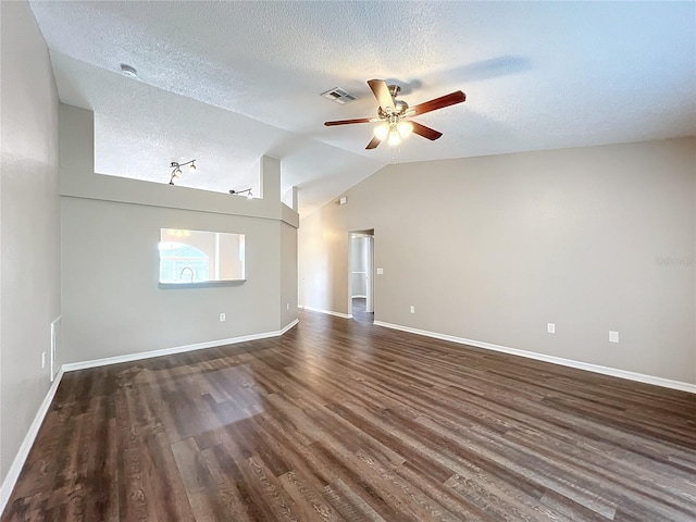 unfurnished living room with vaulted ceiling, ceiling fan, a textured ceiling, and dark hardwood / wood-style flooring