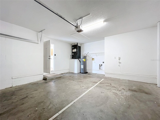 garage with a garage door opener and water heater