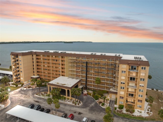 outdoor building at dusk with a water view