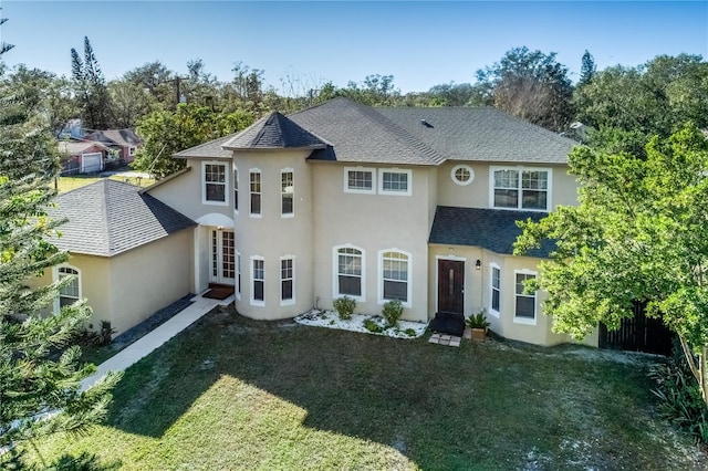 view of front of house with a front lawn