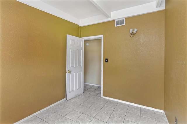 view of tiled spare room