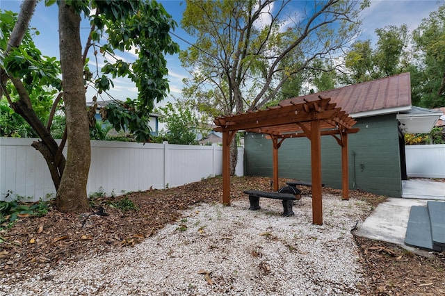 view of yard with a pergola and a fenced backyard