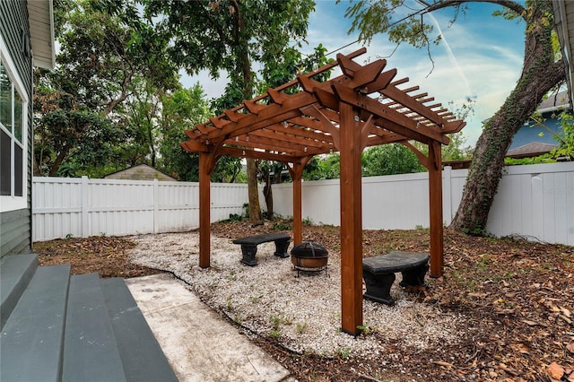 view of patio / terrace featuring a fenced backyard and a pergola