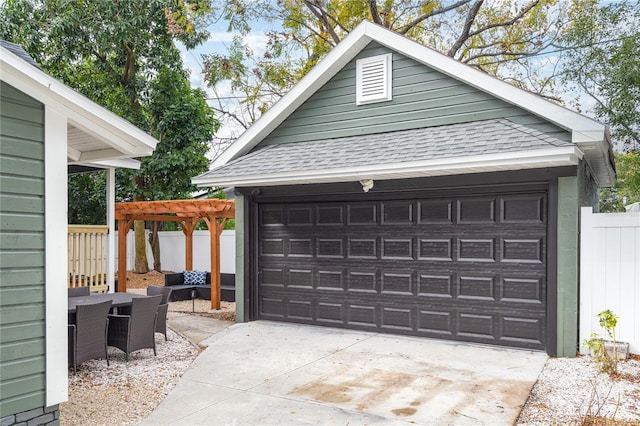 detached garage with fence