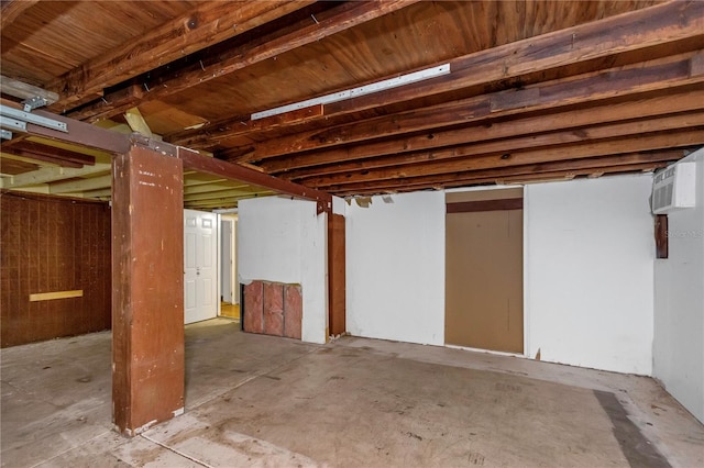 basement with an AC wall unit