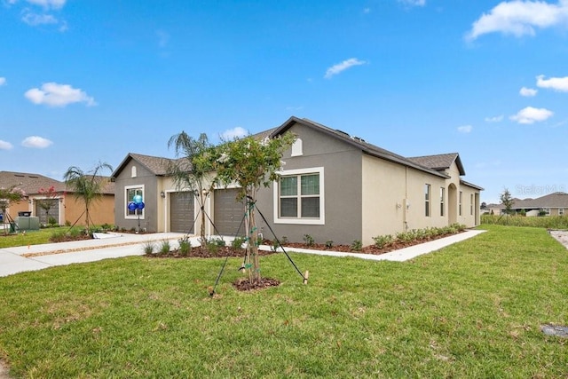 ranch-style home featuring a garage and a front yard