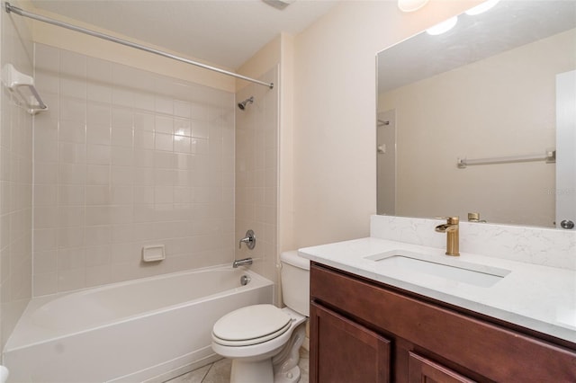 full bathroom featuring tile patterned floors, vanity, toilet, and bathtub / shower combination