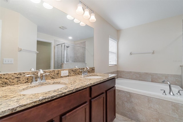 bathroom with tile patterned floors, plus walk in shower, and vanity