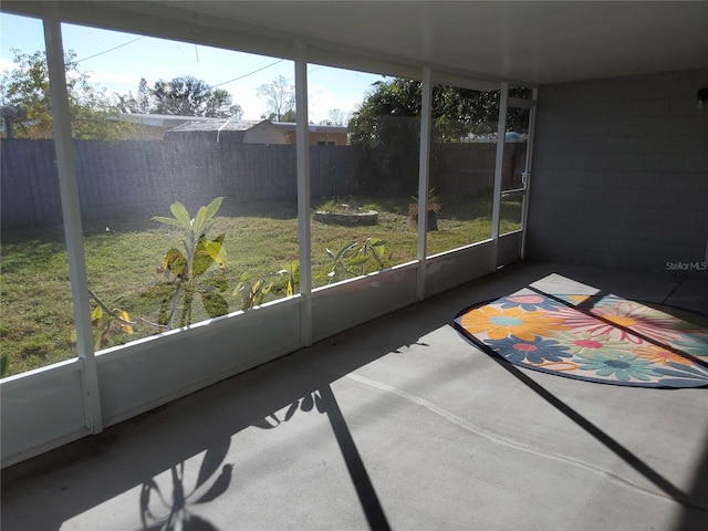 unfurnished sunroom featuring a healthy amount of sunlight