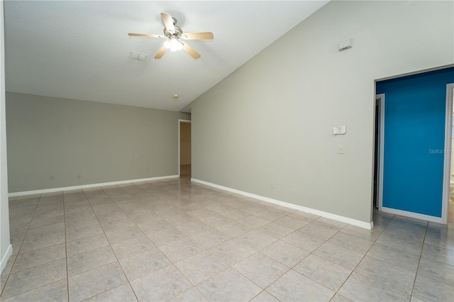 tiled spare room with high vaulted ceiling and ceiling fan