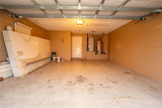 garage with water heater, a garage door opener, and heating unit