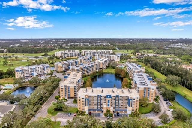 drone / aerial view with a water view