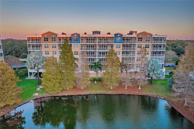 outdoor building at dusk with a water view