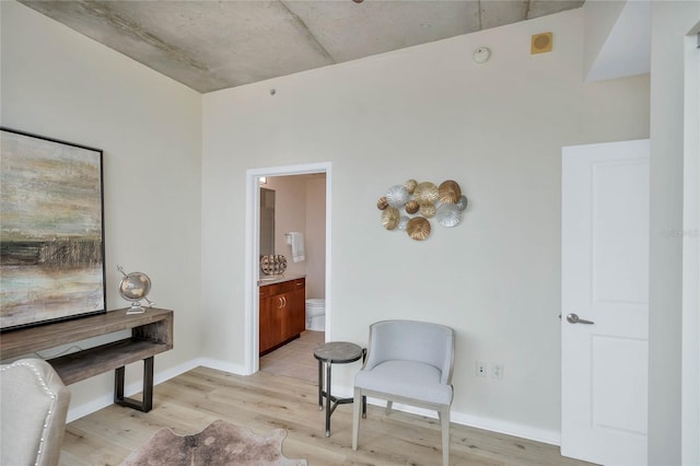 sitting room featuring light wood-type flooring