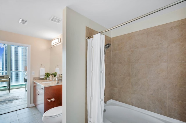 full bathroom with shower / bath combination with curtain, tile patterned floors, toilet, and vanity