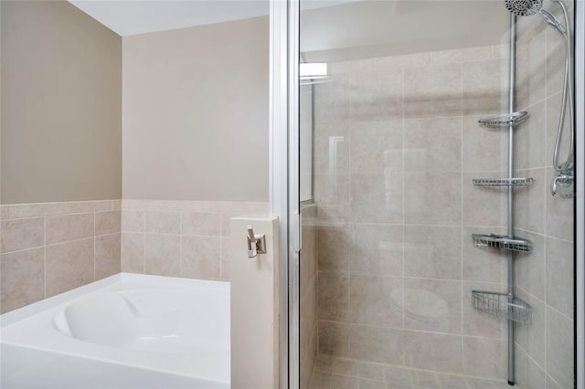 bathroom with independent shower and bath