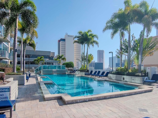 view of swimming pool with a patio