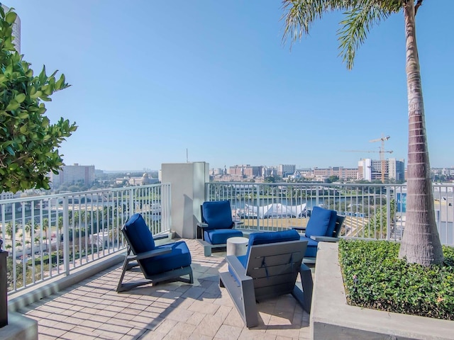 view of patio with a water view