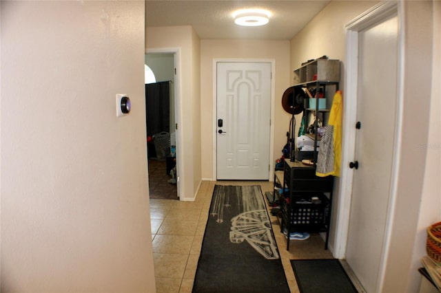 interior space with light tile patterned floors