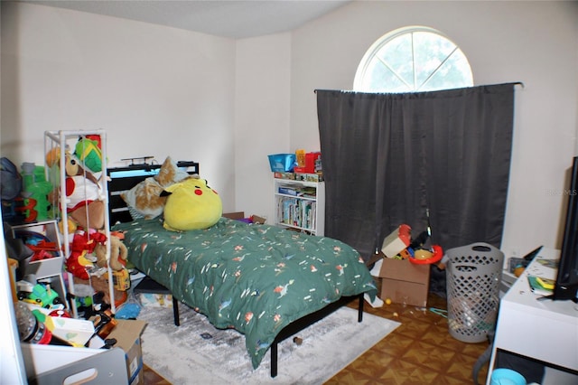 bedroom with parquet flooring