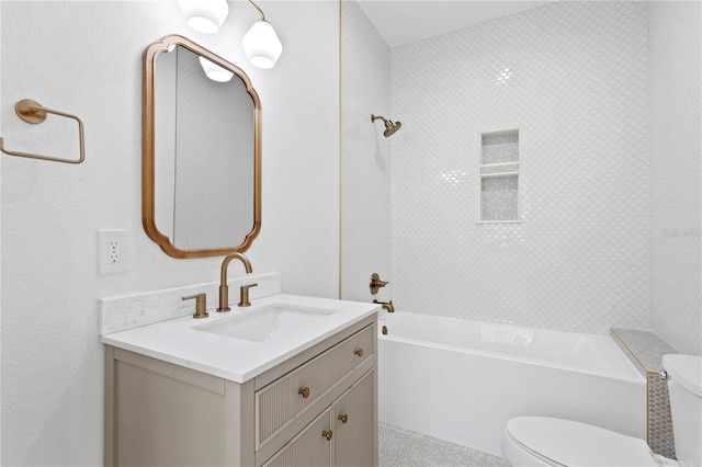 bathroom featuring vanity, toilet, and a bathing tub