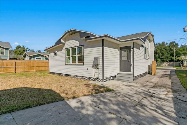 exterior space featuring a front yard