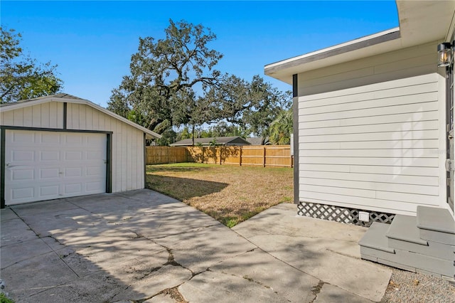 garage with a yard