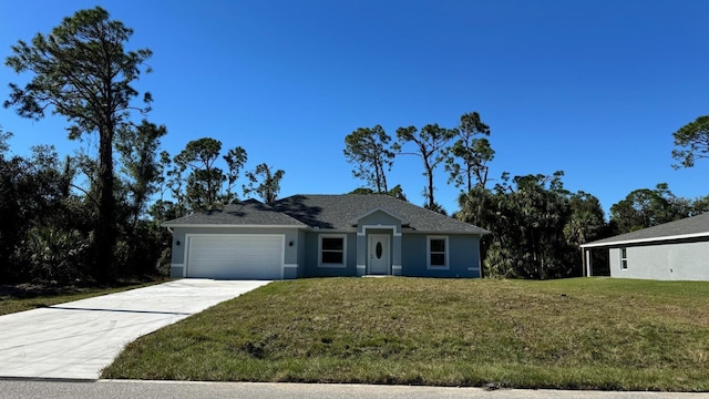 single story home with a front yard and a garage