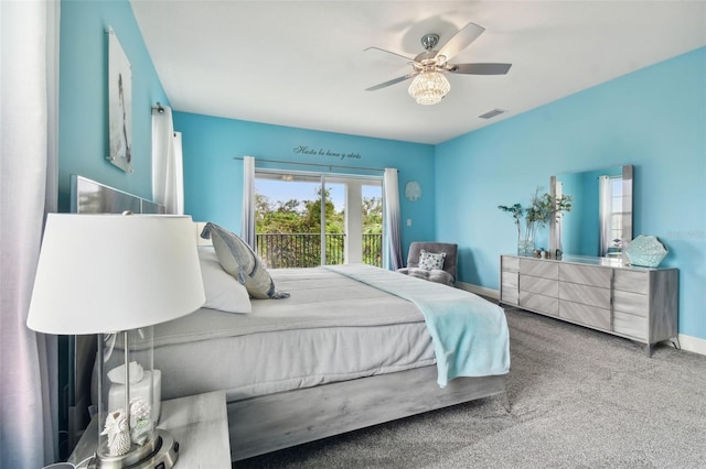 carpeted bedroom featuring access to exterior and ceiling fan