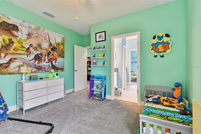 bedroom with light colored carpet