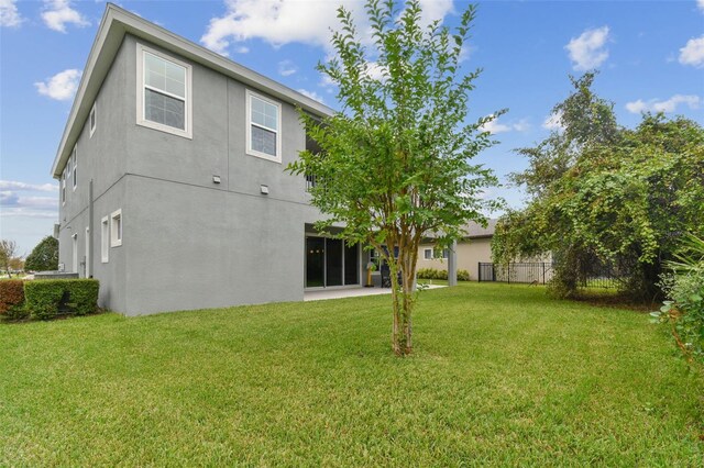 6317 Brevada Ln, Apollo Beach, FL 33572 - back of property with stucco siding