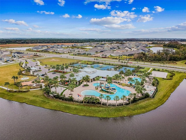 6317 Brevada Ln, Apollo Beach, FL 33572 - aerial perspective of suburban area featuring a pool and a large body of water