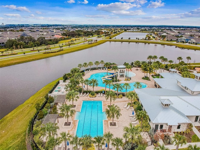 birds eye view of property featuring a water view