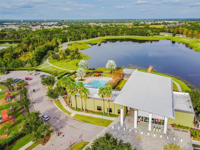 birds eye view of property with a water view