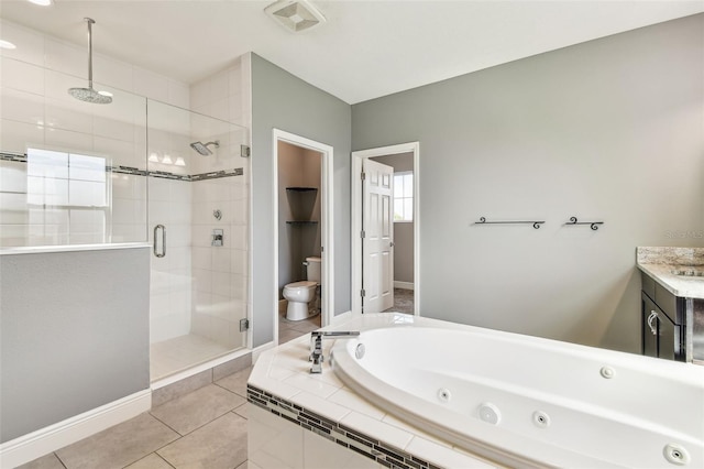 6317 Brevada Ln, Apollo Beach, FL 33572 - bathroom featuring a shower stall, toilet, a tub with jets, vanity, and tile patterned flooring
