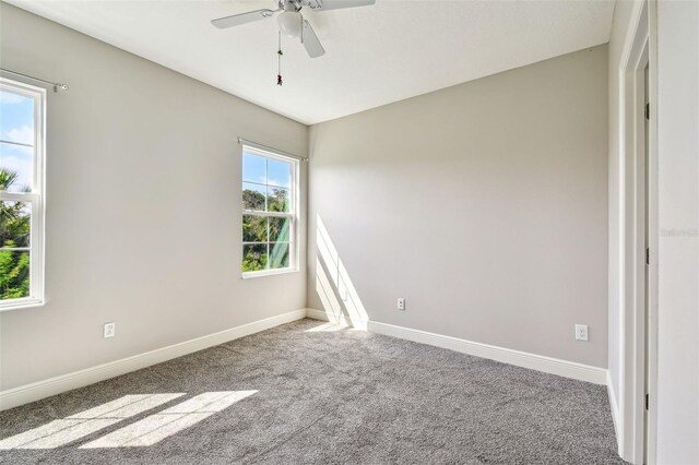 6317 Brevada Ln, Apollo Beach, FL 33572 - unfurnished room featuring baseboards, carpet floors, and a ceiling fan