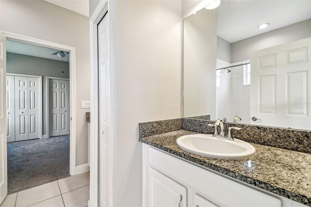 6317 Brevada Ln, Apollo Beach, FL 33572 - full bath with vanity, tile patterned flooring, and a shower
