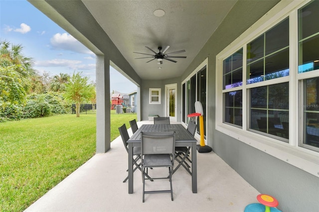 6317 Brevada Ln, Apollo Beach, FL 33572 - view of patio / terrace featuring outdoor dining space and ceiling fan